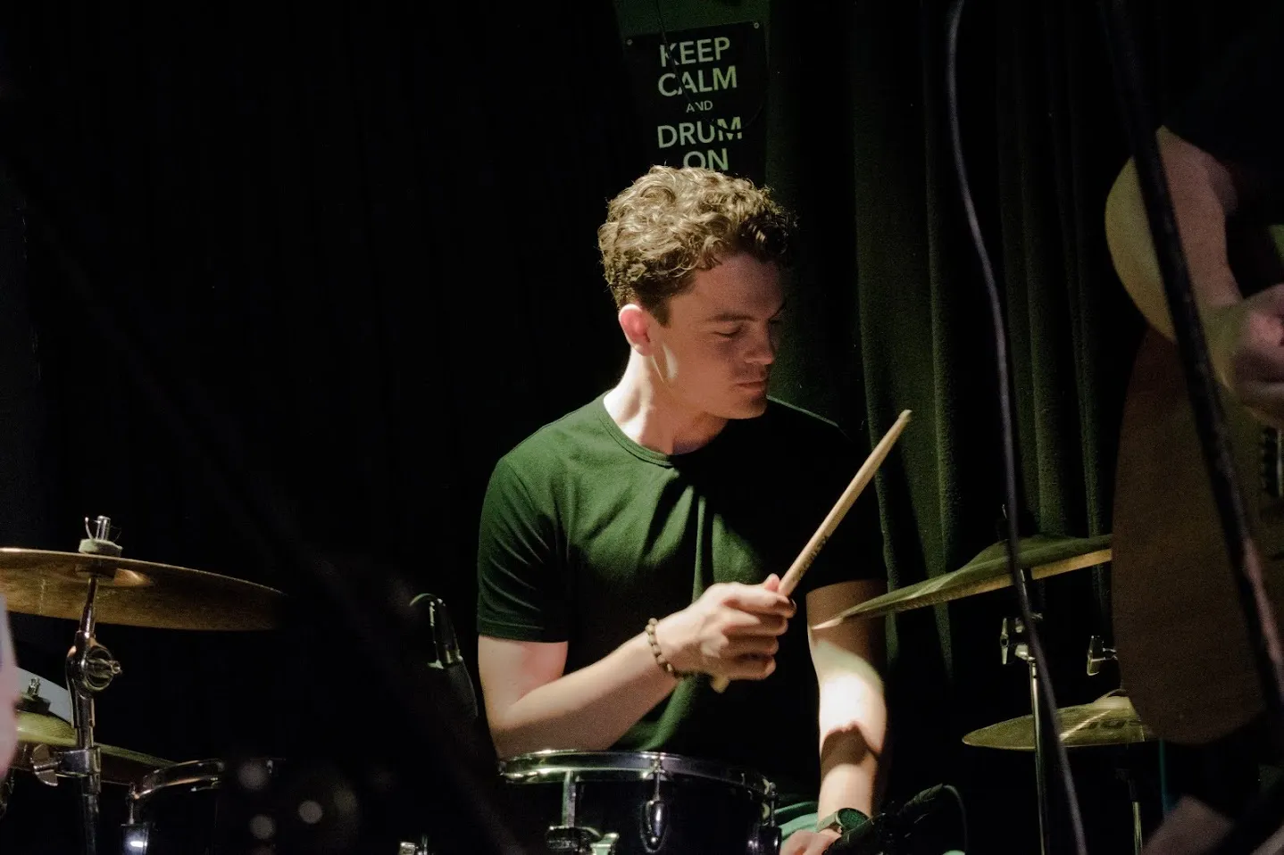 Tom playing drums